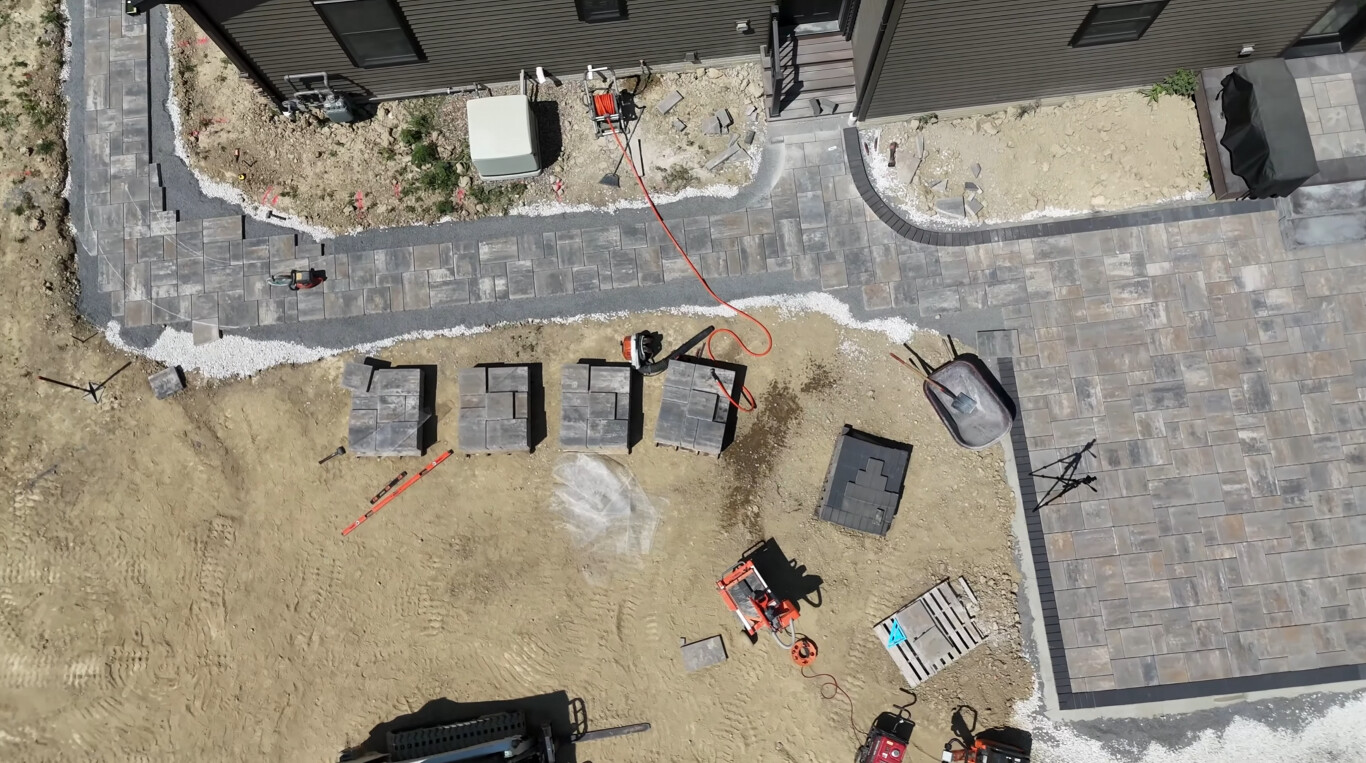 Premium stamped concrete patio installation aerial view showing quality workmanship